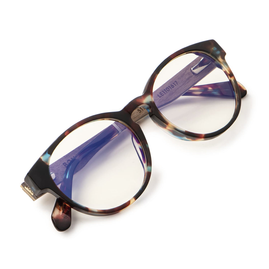 marcos opticos redondos carey para hombre y mujer que necesitan usar lentes con receta oftalmológica para miopía astigmatismo o presbicia. Lentes de lectura gratis con filtro azul. #color_carey